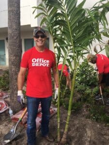 man wearing home depot shirt